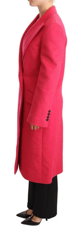 Pink double-breasted trenchcoat jacket by Dolce & Gabbana, shown on a model, featuring classic design and stylish fabric details.
