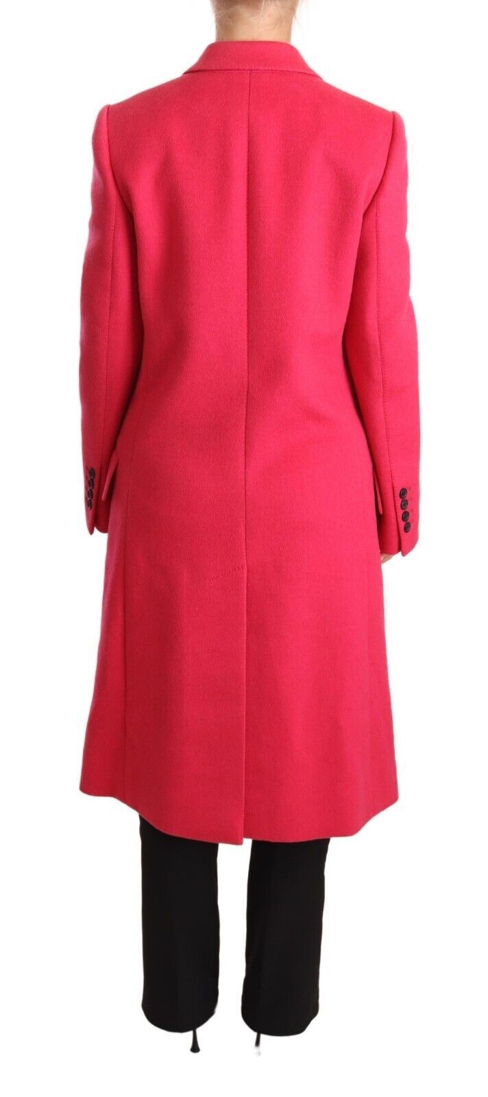 Pink double-breasted trenchcoat jacket by Dolce & Gabbana hanging on a clothing rack with a classic design and stylish details.