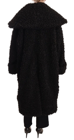 Black polyester fur trench coat jacket by Dolce & Gabbana, featuring a stylish, sleek design with fur accents and a classic silhouette.