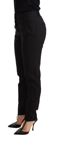 Black tapered women's trousers made of virgin wool by Dolce & Gabbana, showcasing a tailored fit and classic style.