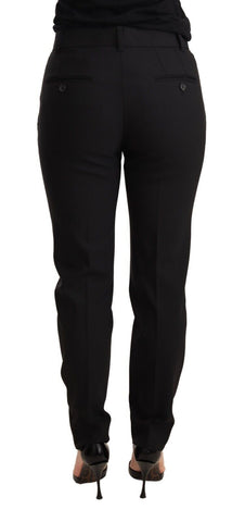 Black tapered women's trouser made of virgin wool by Dolce & Gabbana, showing a stylish, tailored fit and sleek fabric.