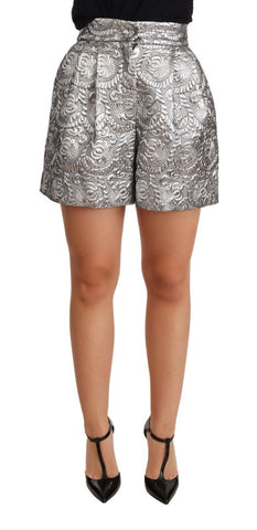 Silver floral brocade high waist shorts by Dolce & Gabbana, showcasing intricate floral patterns and elegant high waist design.