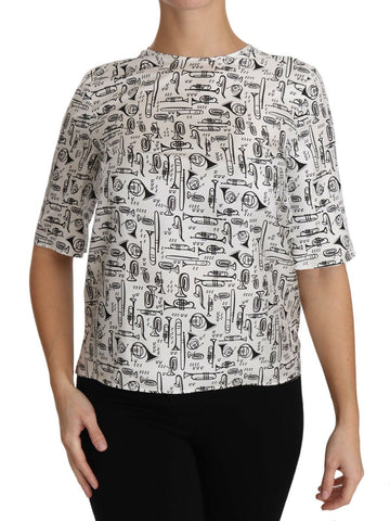 White blouse featuring musical instruments print by Dolce & Gabbana, stylish long-sleeve top with a feminine fit.