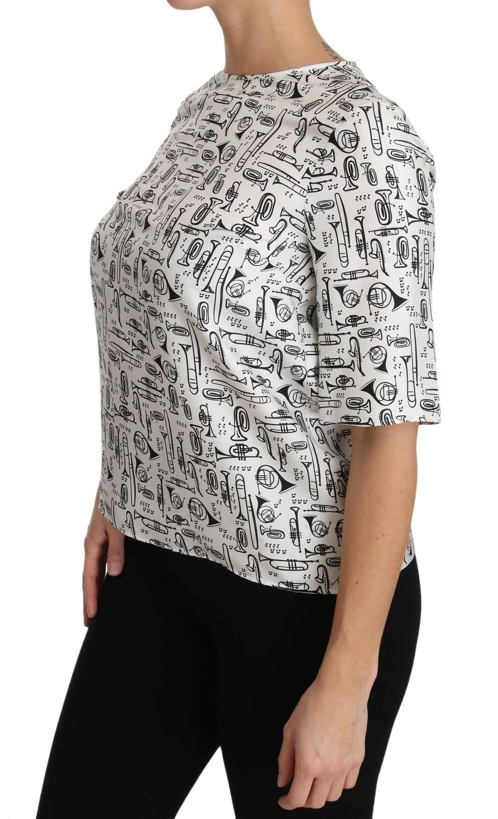 White blouse with musical instruments print by Dolce & Gabbana, featuring long sleeves and a stylish, elegant design.
