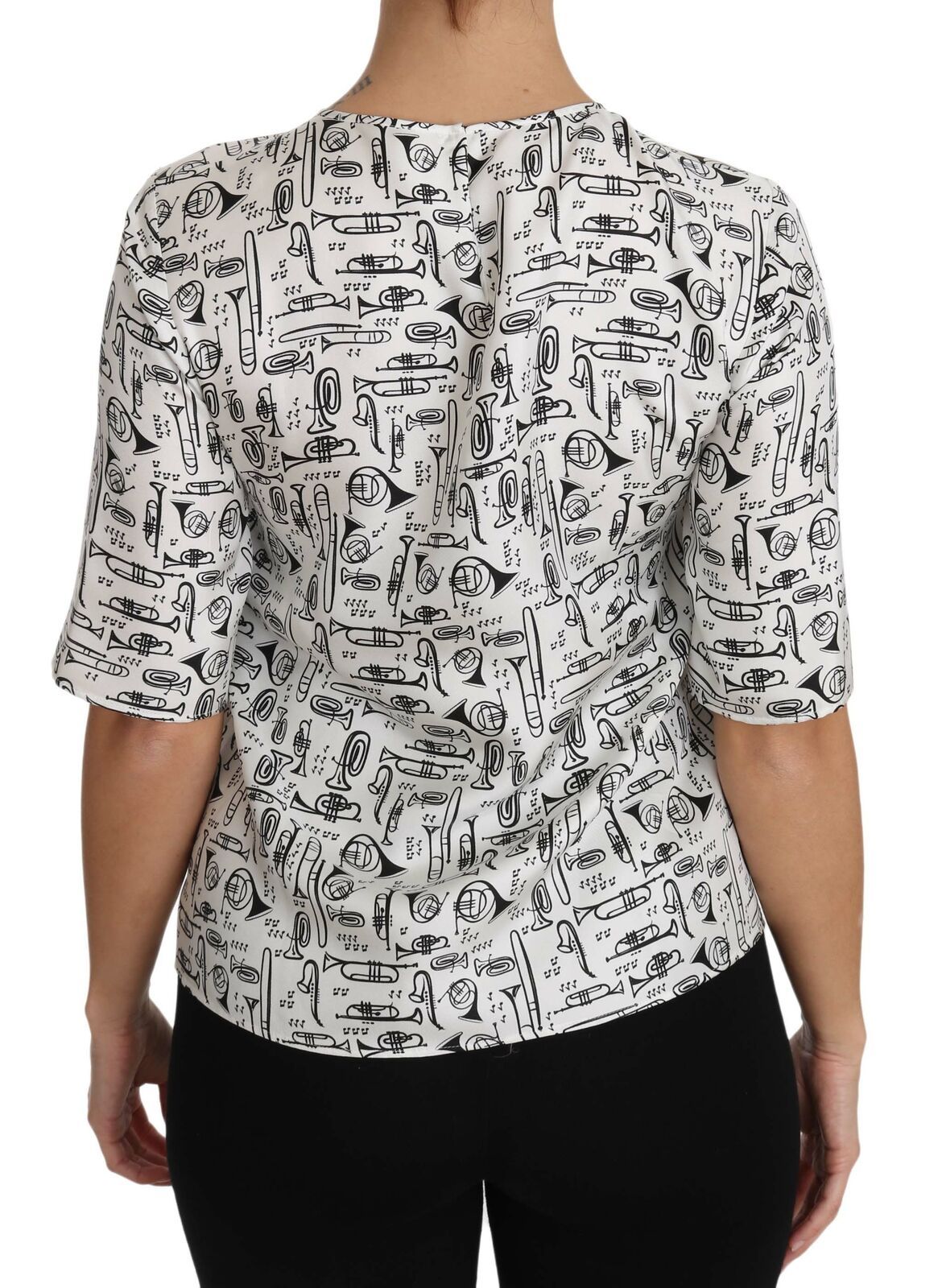 White blouse with musical instruments print from Dolce & Gabbana, featuring a stylish, lightweight design and elegant long sleeves.