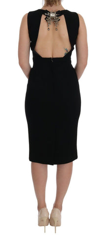 Black stretch crystal sheath gown dress by Dolce & Gabbana, featuring a fitted silhouette and sparkling crystal embellishments.