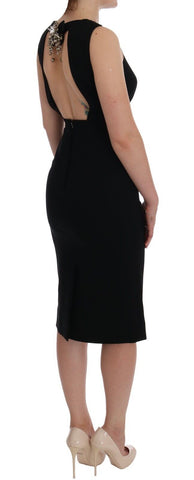 Black stretch crystal sheath gown dress by Dolce & Gabbana, featuring a fitted silhouette with sparkling crystal embellishments.