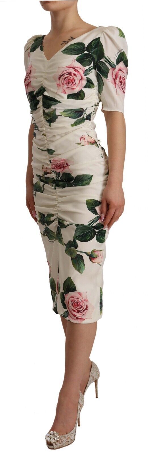 White roses print stretch silk pleated dress by Dolce & Gabbana, featuring elegant pleats and a flowing silhouette.