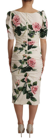 White roses print Dolce & Gabbana silk pleated dress, featuring elegant stretch silk fabric and a flowing pleated design.