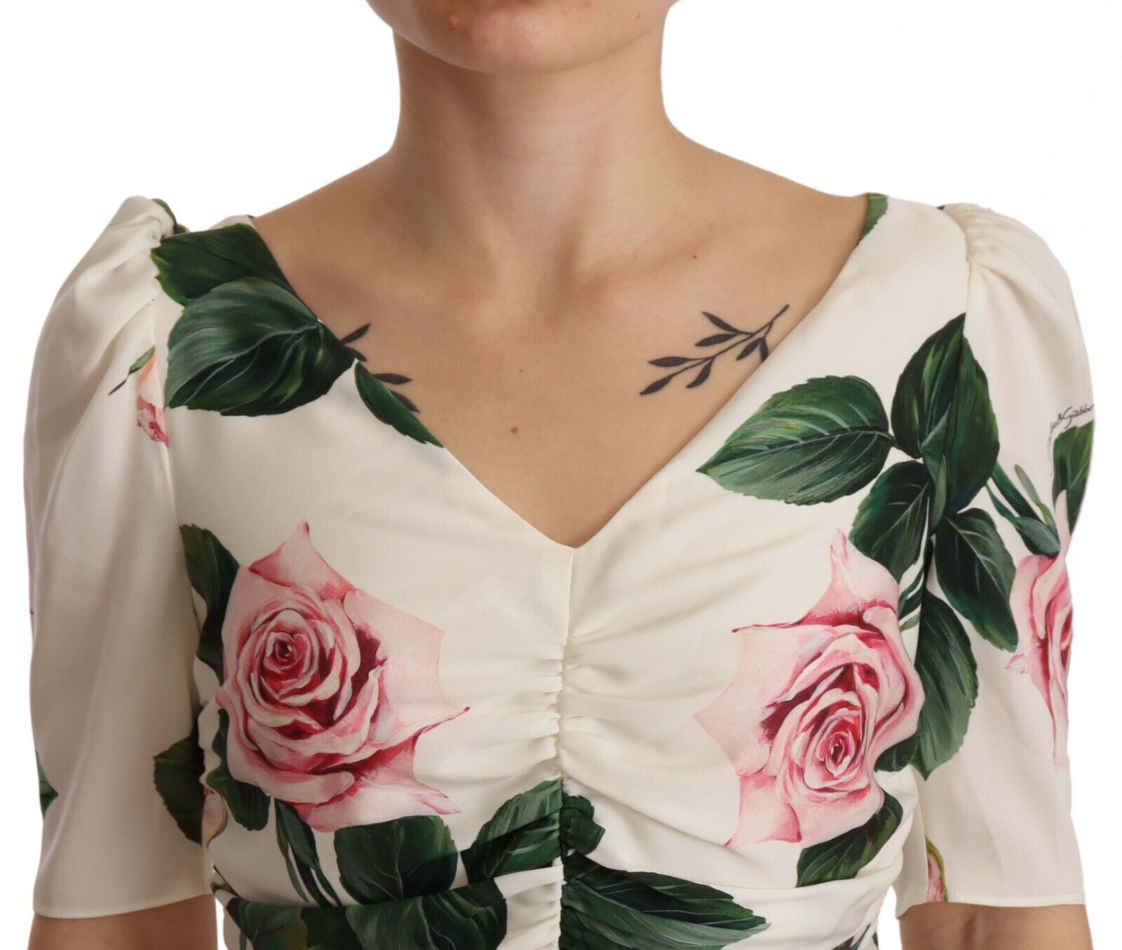 White roses print Dolce & Gabbana stretch silk pleated dress, showcasing elegant floral pattern and sophisticated design.