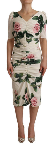 White roses print stretch silk pleated dress by Dolce & Gabbana, featuring elegant pleats and floral pattern.