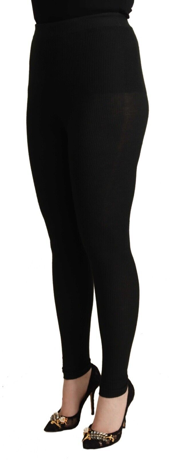 Black cashmere stretch waist tights pants by Dolce & Gabbana, showing the smooth fabric and fitted design.