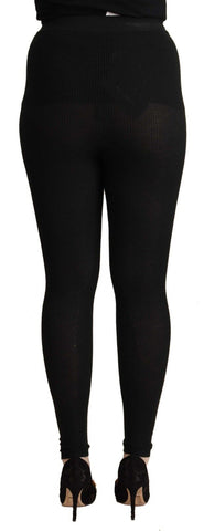 Black cashmere stretch waist tights pants by Dolce & Gabbana, featuring a smooth, fitted design and comfortable waistband.