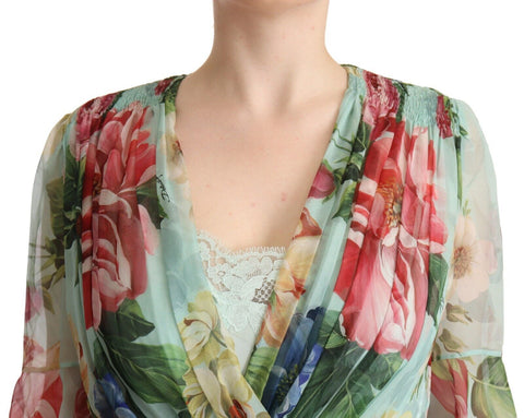 Green floral long sleeve V-neck midi dress by Dolce & Gabbana with a fitted waist and flowing skirt, perfect for elegant occasions.
