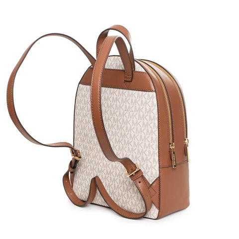 Michael Kors vanilla handbag with gold hardware, featuring sleek design and structured shape, displayed on a neutral background.