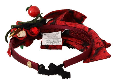 Red tiara hair headband with crystal bow and berry fruit design, elegant diadem by Dolce & Gabbana
