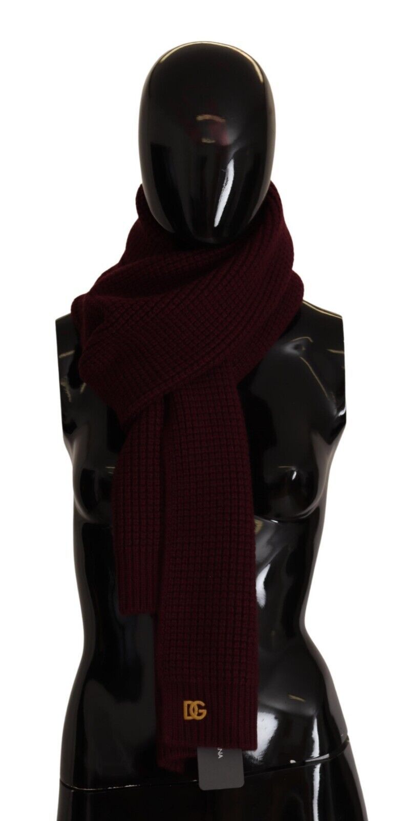 Dark red Dolce & Gabbana cashmere wrap shawl featuring a logo design, knitted texture, and elegant drape.