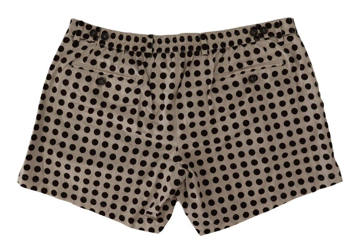 Black and white polka dot cotton linen shorts by Dolce & Gabbana, featuring a relaxed fit and stylish design.