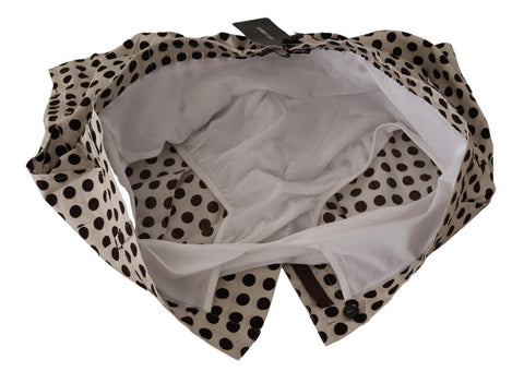 Dolce & Gabbana black and white polka dot cotton linen shorts with a relaxed fit and stylish design.