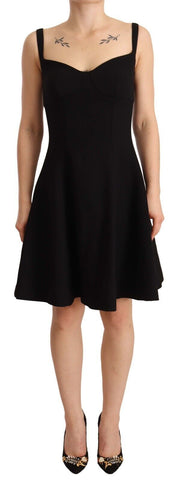 Black fit flare wool stretch sheath dress by Dolce & Gabbana, shown on a mannequin against a plain background.
