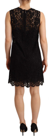 Black floral lace sheath sleeveless mini dress by Dolce & Gabbana, showing intricate lace details and fitted silhouette.