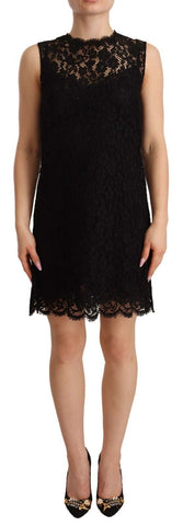 Black floral lace sheath sleeveless mini dress by Dolce & Gabbana, showcasing intricate lace details and a fitted silhouette.