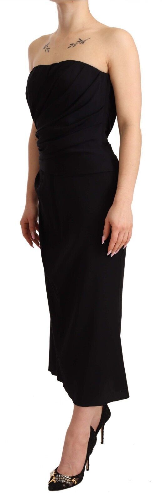 Black silk stretch strapless sheath midi dress by Dolce & Gabbana, featuring a sleek, fitted silhouette and elegant design.