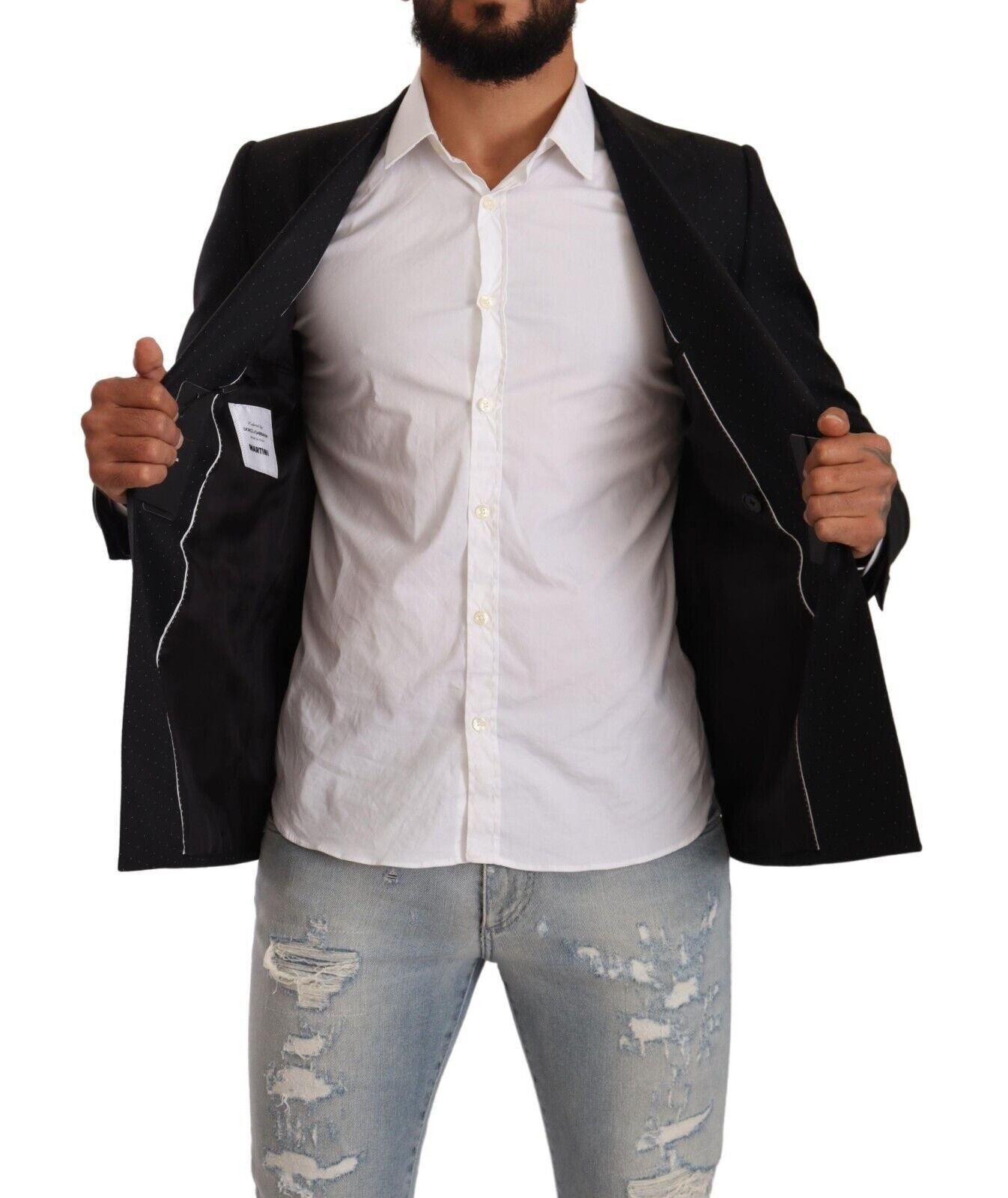 Black dotted double-breasted Martini jacket by Dolce & Gabbana with tailored fit and stylish lapels, shown on a model.