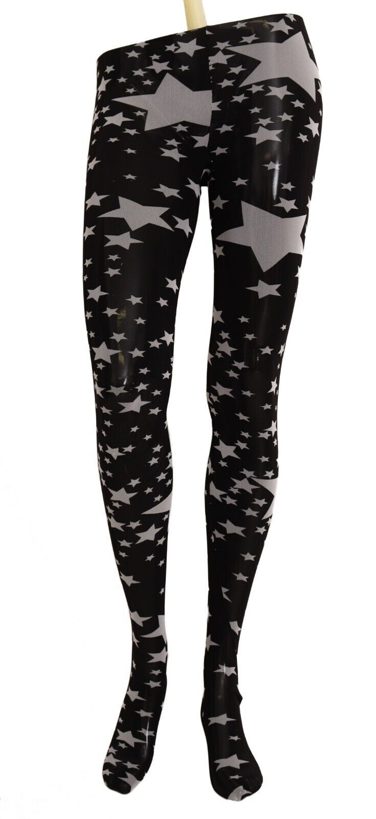 Black nylon stockings with white star print by Dolce & Gabbana, featuring a sheer, smooth texture and star pattern design.