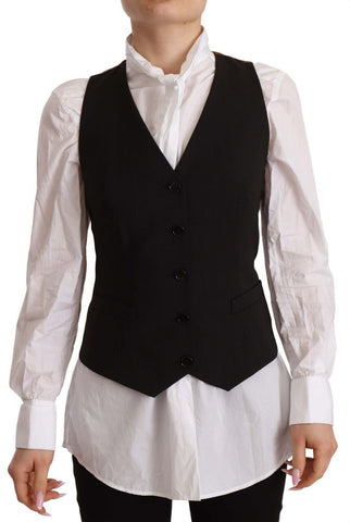 Black sleeveless button-down vest made of polyester by Dolce & Gabbana, displayed on a hanger.