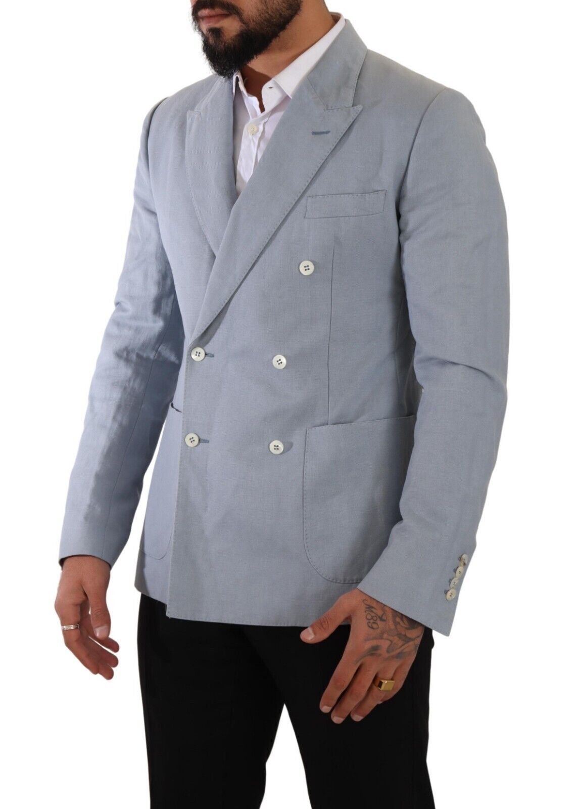 Blue cotton linen slim fit jacket blazer by Dolce & Gabbana, shown on a hanger, featuring a tailored design and classic lapel collar.