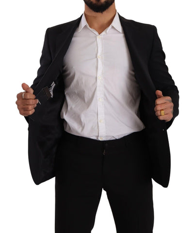 Black slim fit vest with two buttons, Martini blazer style by Dolce & Gabbana, visible on a mannequin.
