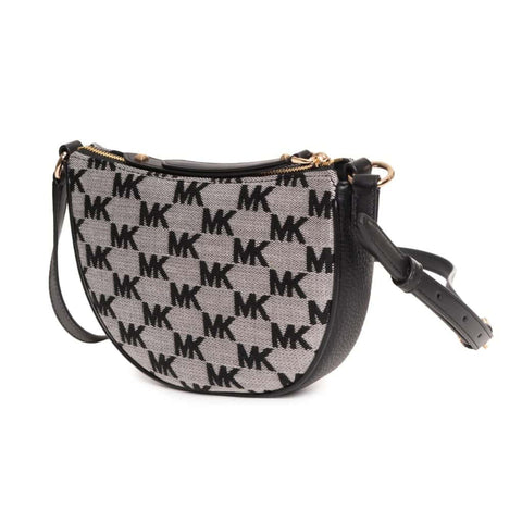 Black Michael Kors handbag with gold accents, featuring sleek design and logo detailing, by Jag Couture London - New York.
