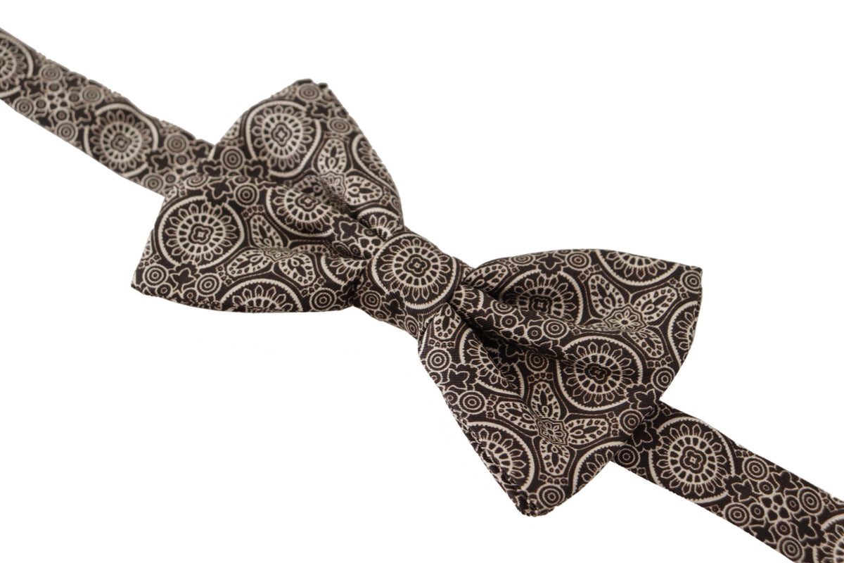 Black and white 100% silk adjustable neck papillon tie by Dolce & Gabbana, featuring a sleek, elegant bow design.
