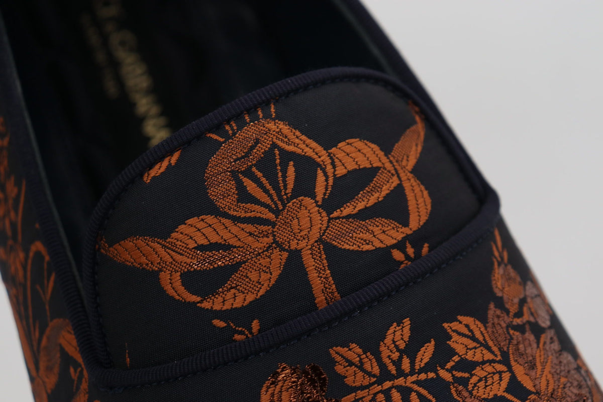 Blue rust floral Dolce & Gabbana slippers with loafers style, featuring intricate floral embroidery and stylish design.