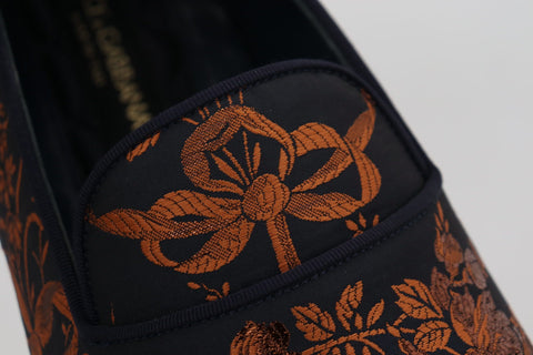 Blue rust floral Dolce & Gabbana slippers with loafers style, featuring intricate floral embroidery and stylish design.