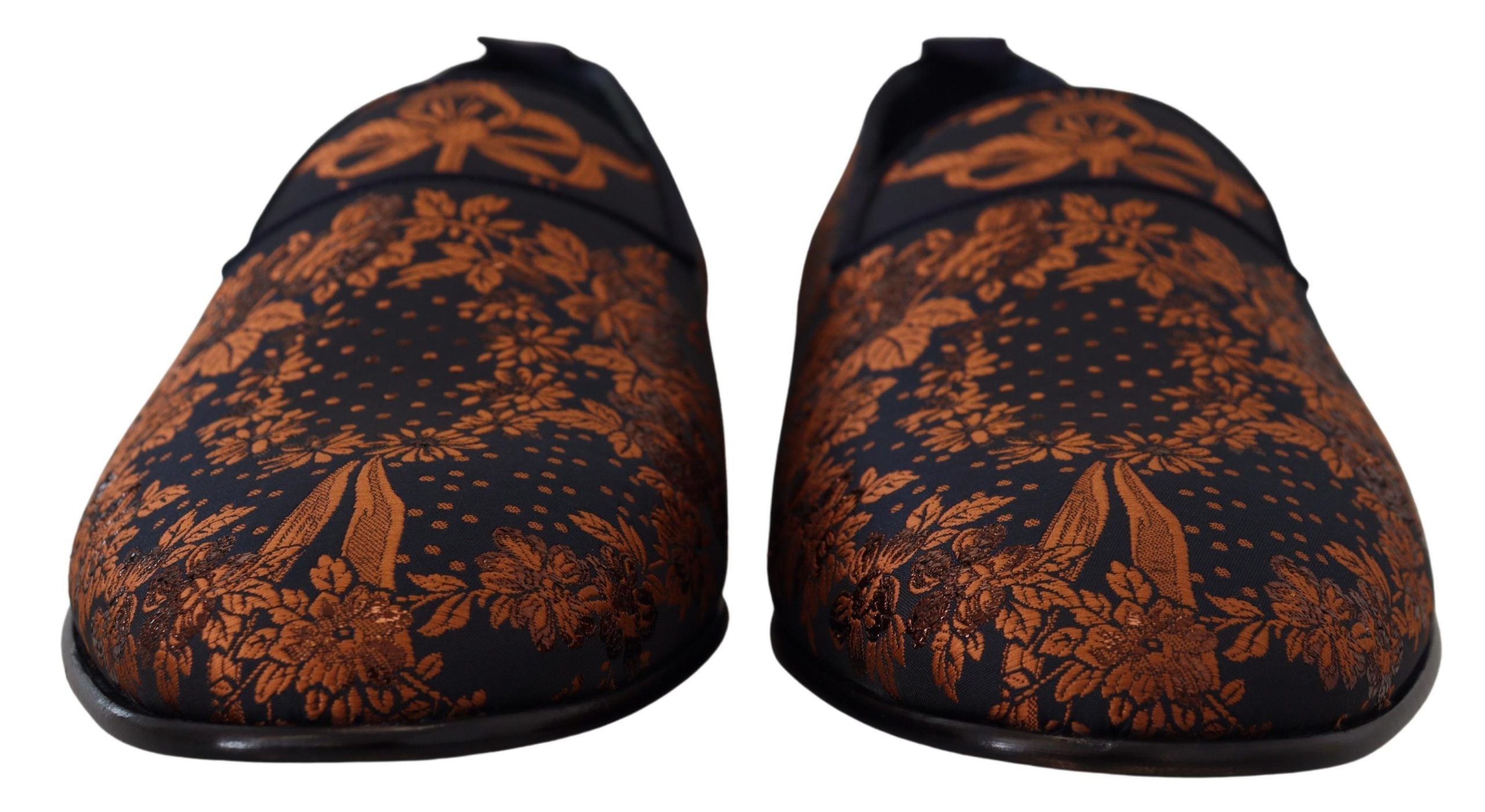 Blue rust floral slippers loafers by Dolce & Gabbana with a textured floral pattern and comfortable slip-on design.