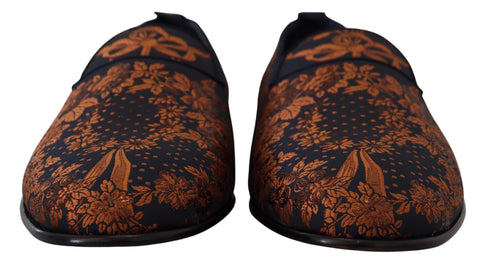 Blue rust floral slippers loafers by Dolce & Gabbana with a textured floral pattern and comfortable slip-on design.