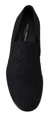 Black floral jacquard slippers loafers by Dolce & Gabbana with intricate floral pattern and sleek slip-on design.