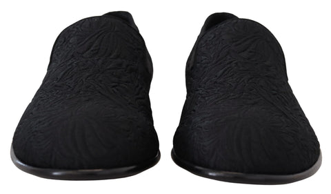 Dolce & Gabbana black floral jacquard slippers loafers shoes with intricate floral pattern and slip-on design.