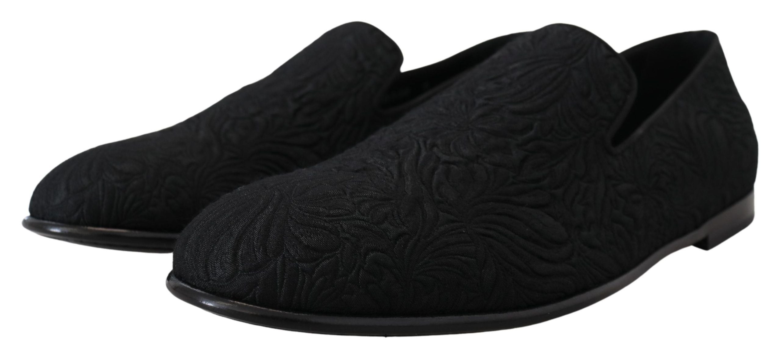 Dolce & Gabbana black floral jacquard slippers loafers with intricate floral pattern and slip-on design.