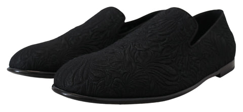 Dolce & Gabbana black floral jacquard slippers loafers with intricate floral pattern and slip-on design.