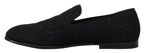 Dolce & Gabbana black floral jacquard slippers loafers with intricate floral pattern and slip-on design.
