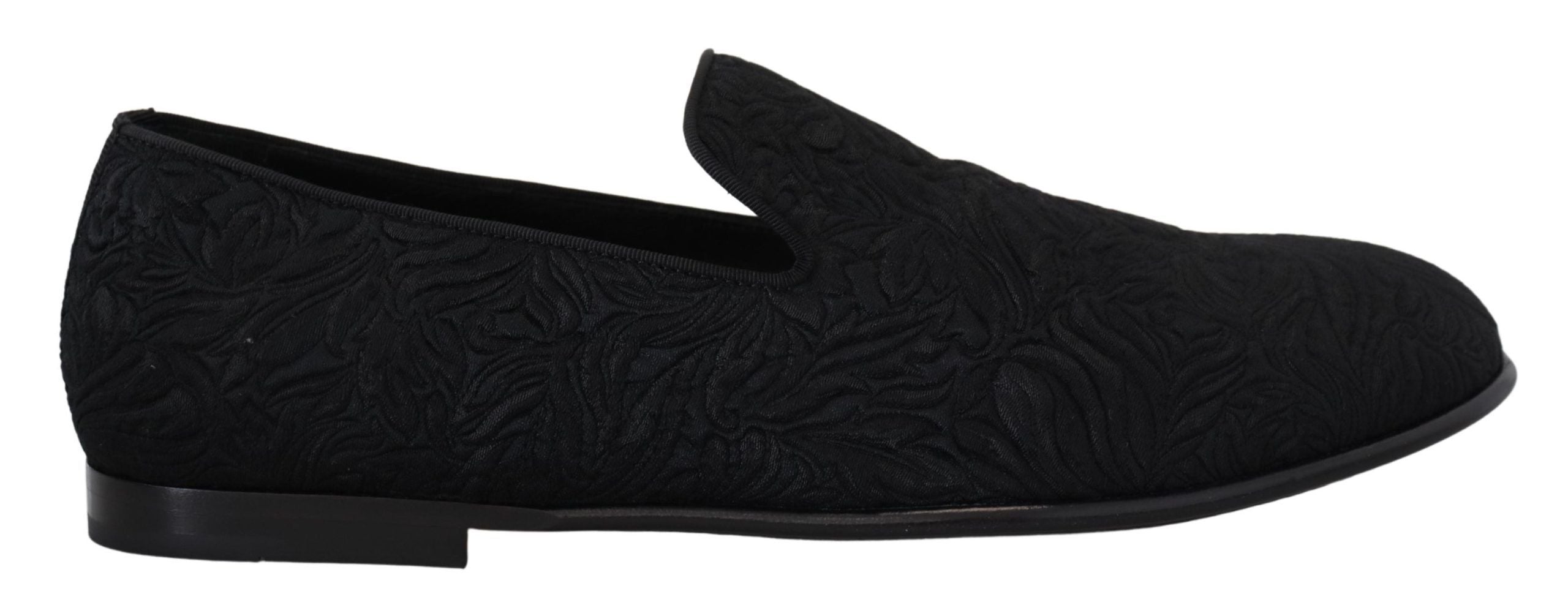 Black floral jacquard loafers by Dolce & Gabbana featuring elegant slip-on design and intricate floral pattern.