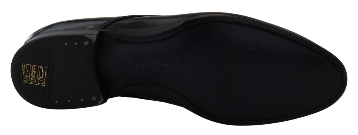 Black leather formal dress shoes by Dolce & Gabbana, sleek design with polished finish, ideal for elegant occasions.