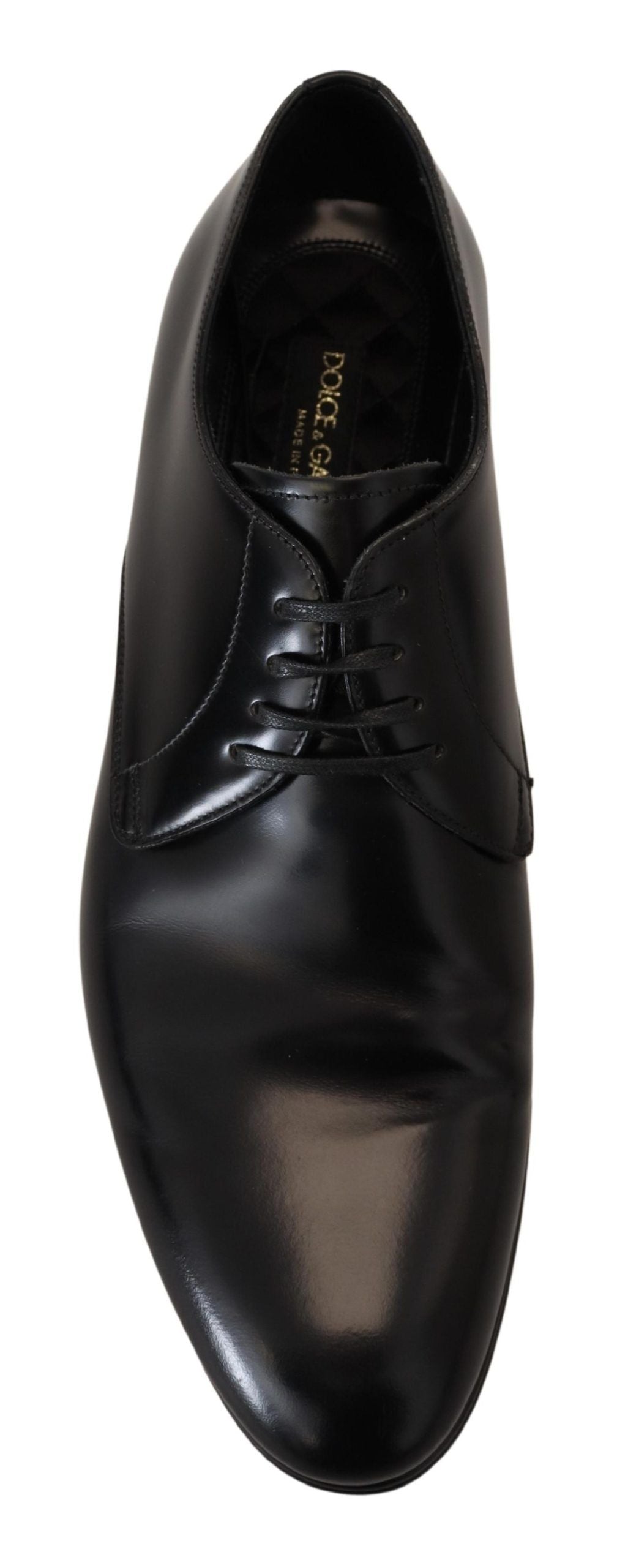 Black leather formal dress shoes by Dolce & Gabbana with sleek design and polished finish.