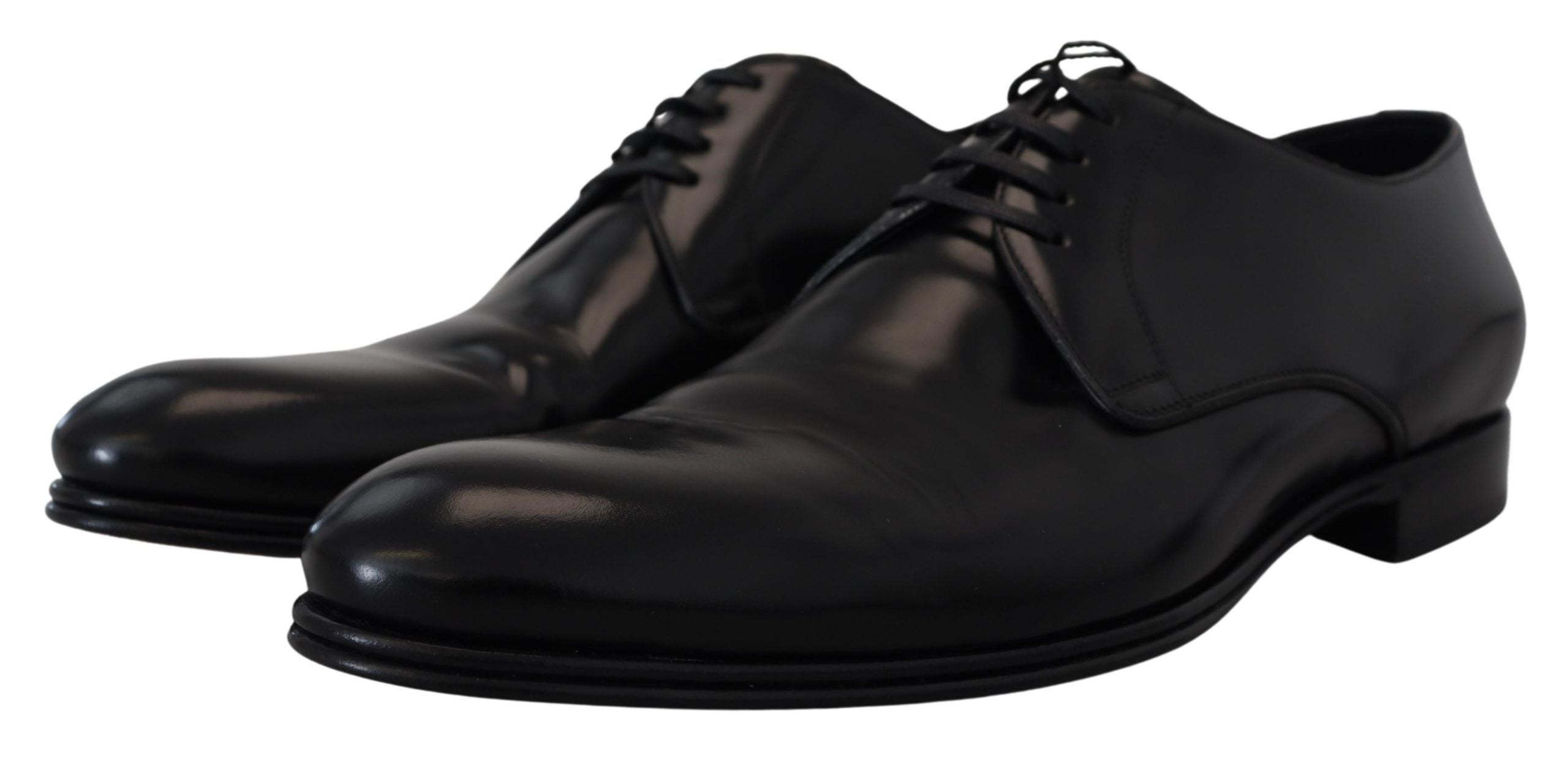 Black leather formal dress shoes by Dolce & Gabbana, polished with sleek design and classic lace-up style.