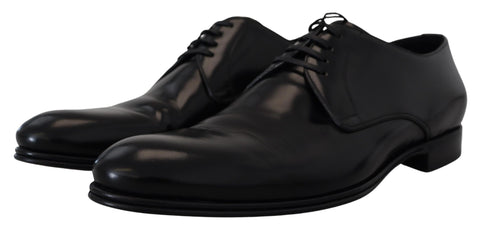 Black leather formal dress shoes by Dolce & Gabbana, polished with sleek design and classic lace-up style.