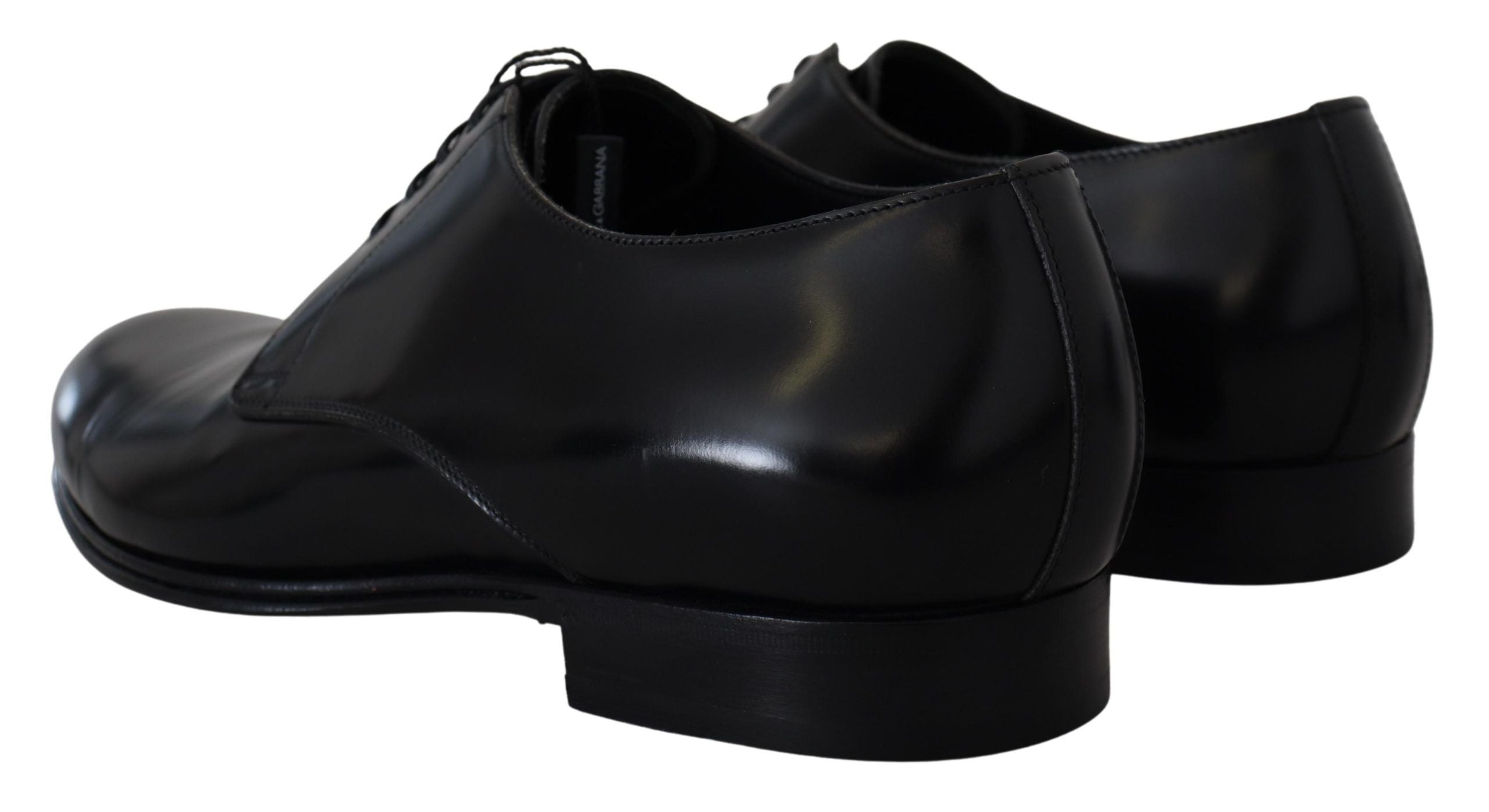 Black leather formal dress shoes by Dolce & Gabbana, sleek design with polished finish and classic lace-up style.