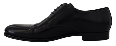 Black leather formal dress shoes by Dolce & Gabbana, sleek design with polished finish, perfect for elegant occasions.